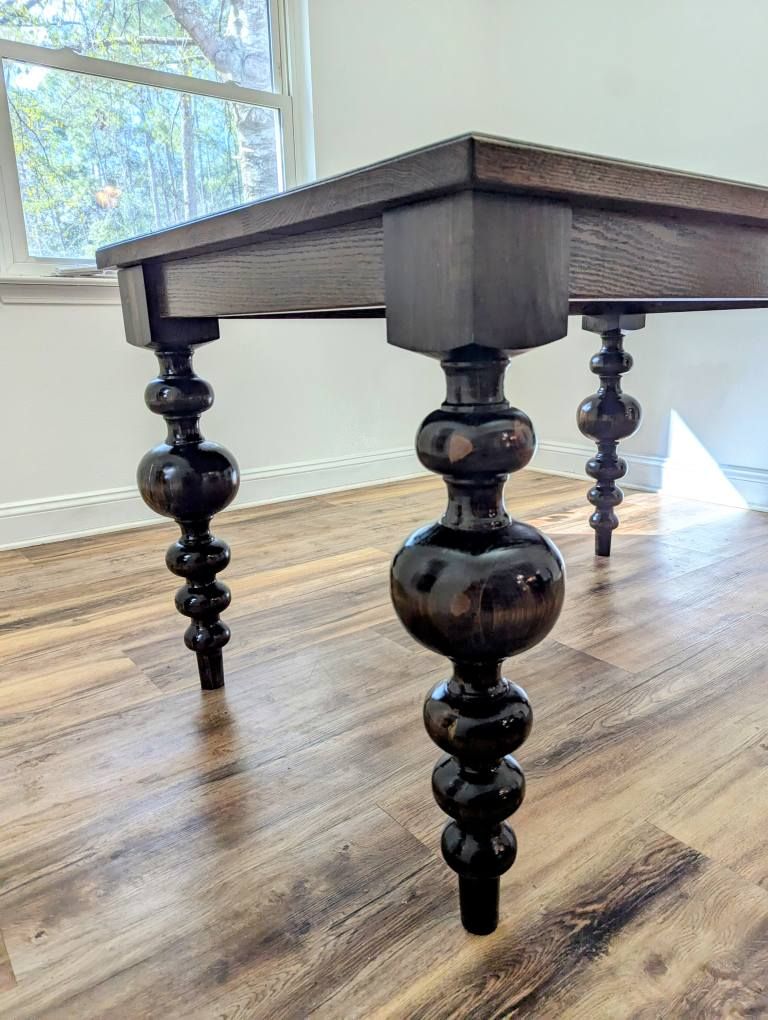 The Germantown: hand-turned bobbin legs in a dark finish under a solid oak top